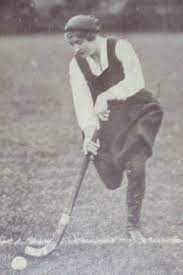 Example of 1923 girl playing field hockey
